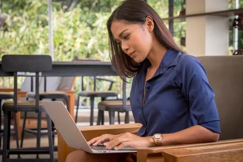 Girl working on a laptop Stock Photos
