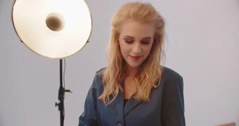 Girl Working On A Laptop In The Studio On A White Background Video stock 172343353