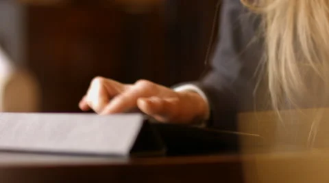 Girl working with tablet computer in caf Stock Footage 63053785