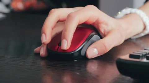 The girl works on a computer . Mouse on the table. 스톡 동영상 52171616