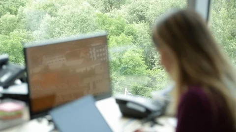 The Girl Works At a Computer By the Window 動画素材 126977152