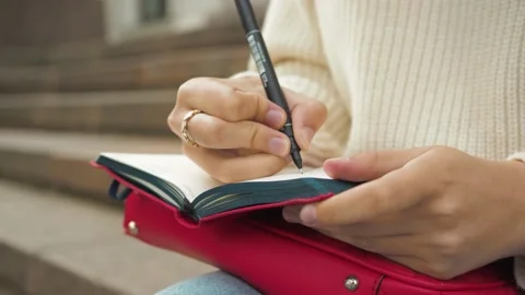 Girl Write Her Thoughts In Her Diary Stock Footage 196984170