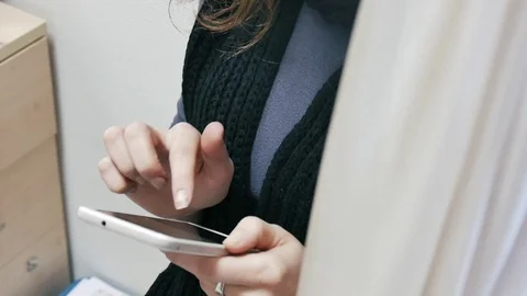 Girl writes the message to a phone Stock Footage 84303553