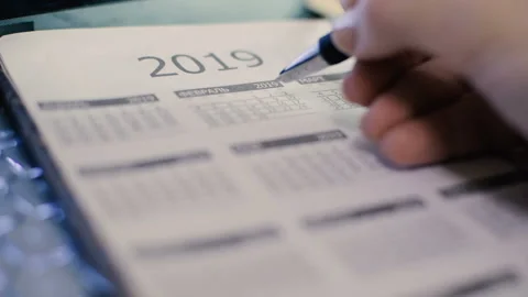 The girl writes something in a notebook. close-up Vídeo Stock 98655065