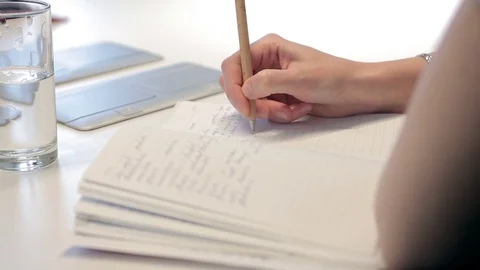 Girl writing notebook Stock Footage 72658800