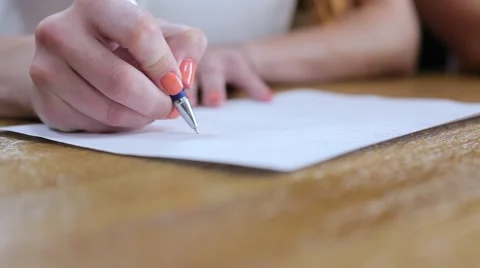 Girl writing on sheet close up Stock Footage 67513889