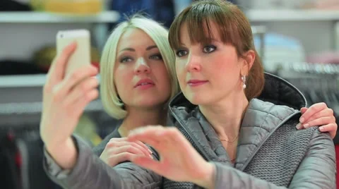 Girlfriends doing funny selfies on your phone Video stock 61121242