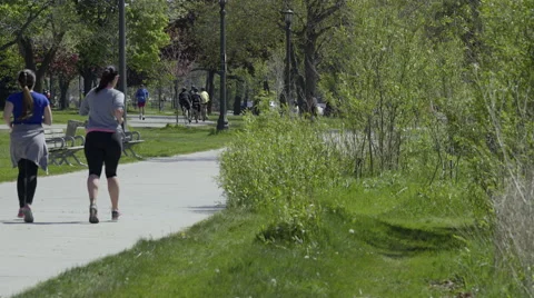 Girlfriends jogging in the park. 4K UHD. Stock-Footage 50594910