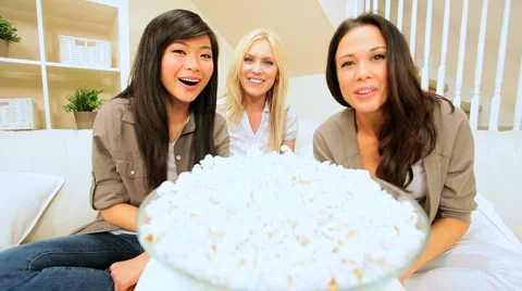 Girlfriends With Popcorn Using Internet Webchat Stock Footage 3981144