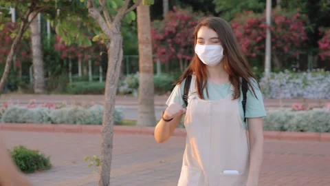 Girlfriends using new way greeting Stock Footage 134958840
