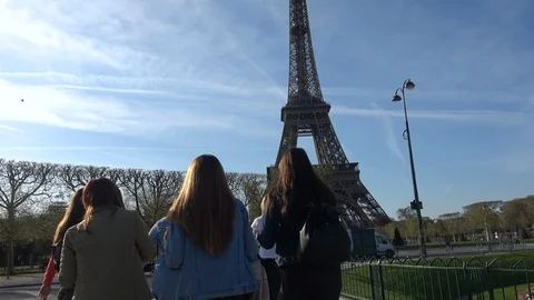 Girls Approaching the Eiffel Tower Stock Footage 103959487