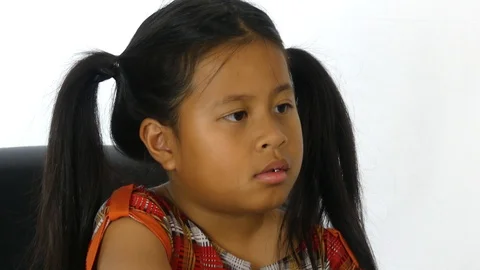 Girls are watching the computer on the table. 動画素材 110134348