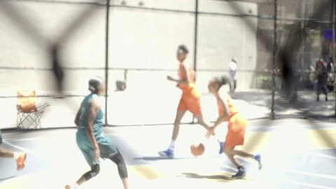 Girls basketball women league playing ball West 4th street court slow motion NYC Stock Footage