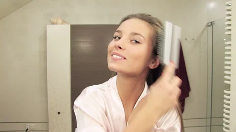 Girls bathroom routine Stock Footage 24674914