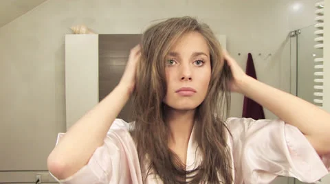 Girls bathroom routine Stock Footage 24674930