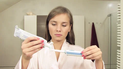 Girls bathroom routine Stock Footage 24674955