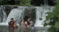 girls of boys have fun in a lake - dancing, hugging and playing with water HD Footage