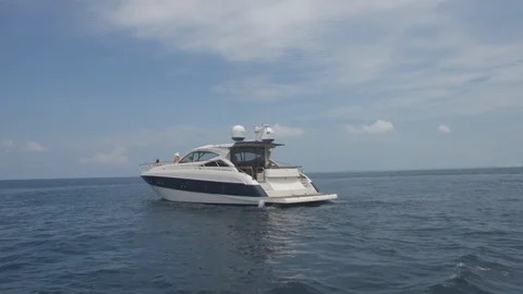 Girls Catching Sun While Lying On Luxury Powerboat At Sea Stock Footage 109234681
