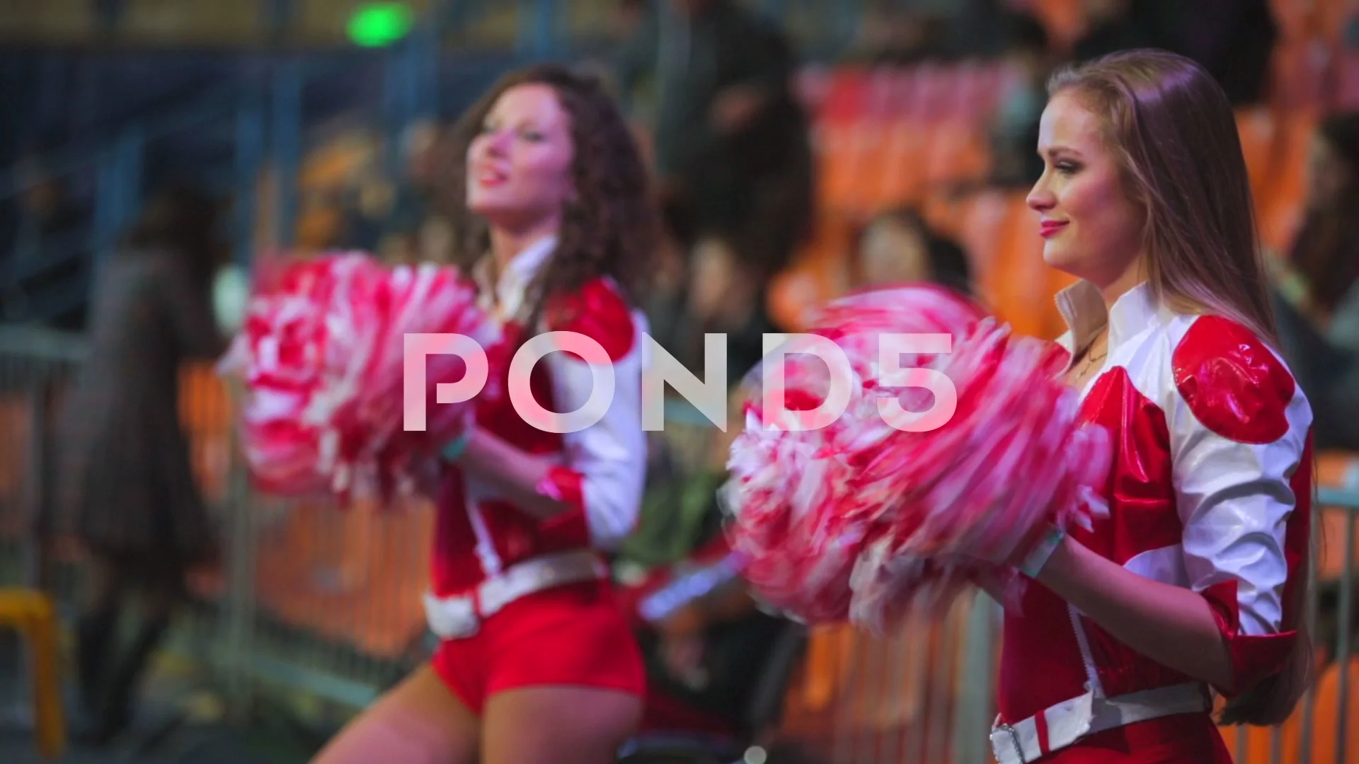 girls cheerleaders with pom-poms in hand, Stock Video