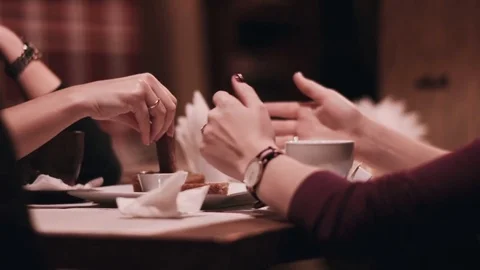 Girls communicate in cafe close-up Stock Footage 76577512