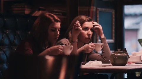Girls communicate in cafe close-up Stock Footage 76578152