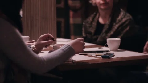 Girls communicate in cafe close-up Stock Footage 76583479