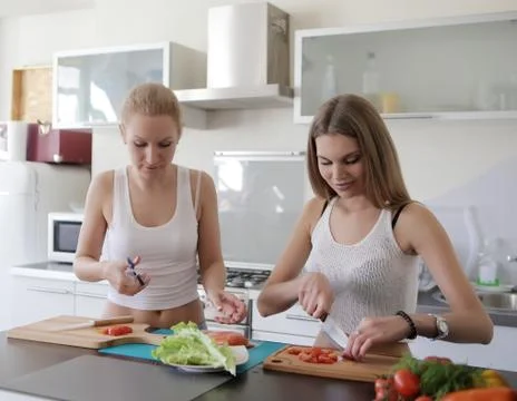 Girls is cooking Stock Photos