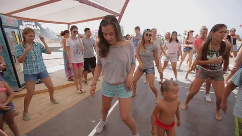 Girls dancing hip-hop during a master class on the coast Stock Footage 73761253