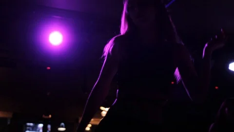 The girls dancing under a strobe light Video stock 88397939