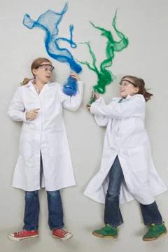 Girls doing experiment Stock Photos