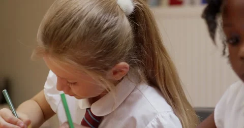 Girls drawing in classroom Stock Footage 58573100