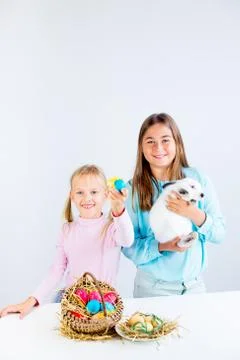 Girls with easter bunny Stock Photos