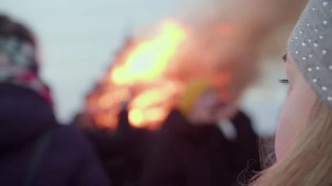 Girl's face on the background of fire Stock Footage 176383425