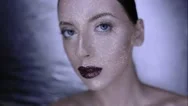 The Girl's Face Is Covered With Gloss And Glitter . Posing Stock Footage