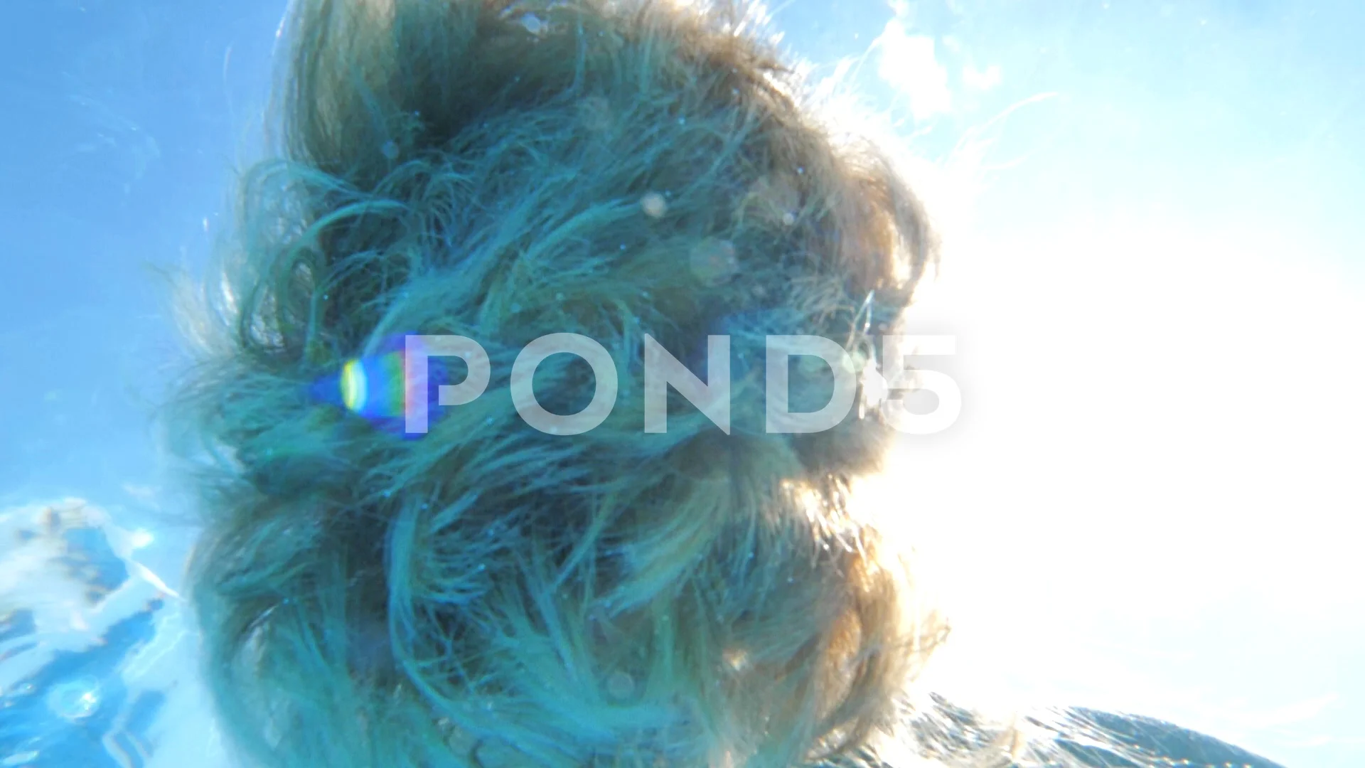 girl underwater hair