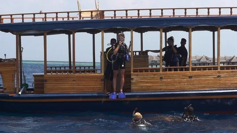 Girls Going Diving Stock Footage 125677600