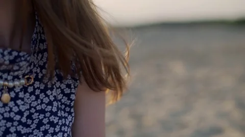 The girl's hair develops in the wind close up. Video stock 85547614