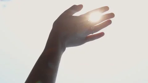 Girl's hand on the background of the sun. Stock Footage 142090235