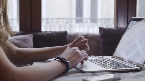 Girls Hand Checking Mail using  tachbar laptop 71698035