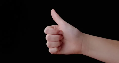 The girl's hand shows a like Video stock 140499308