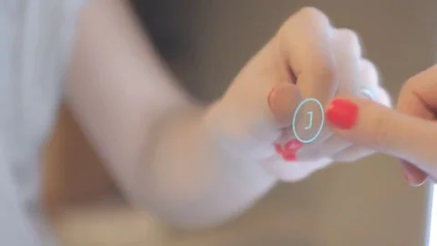 Girl`s hand touch the button green neon Vídeos de archivo 69147185