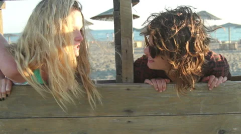 Girls having fun on the beach Stock Footage 65742679