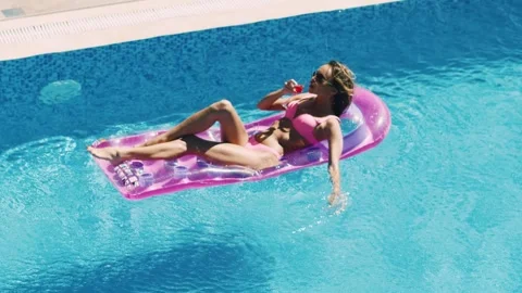 Girls having fun at the poolside Stock Footage 302805803