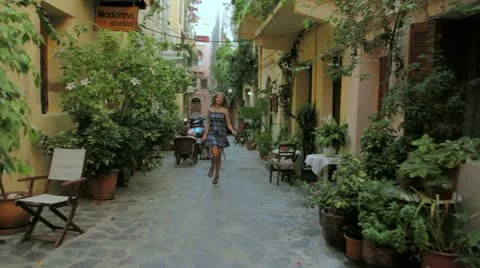 Girls jumping through the streets Stock Footage 10862031