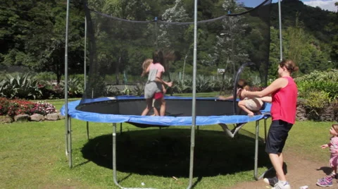 Girls Jumping on Trampoline Stock Footage 59651264