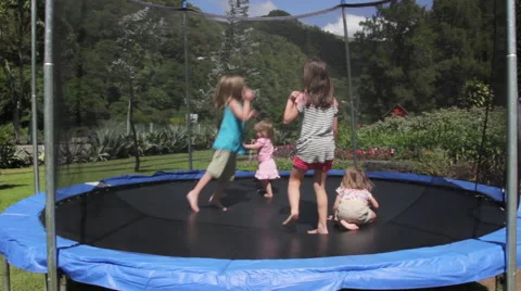Girls Jumping on Trampoline  Video stock 59651311