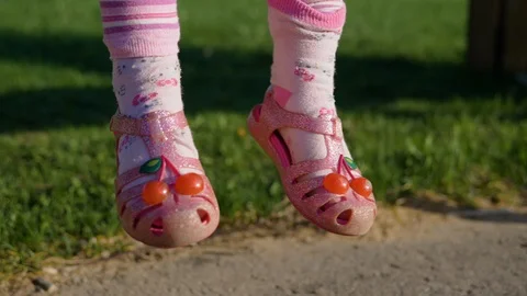 Girl’s legs dangling Stock Footage 101260270