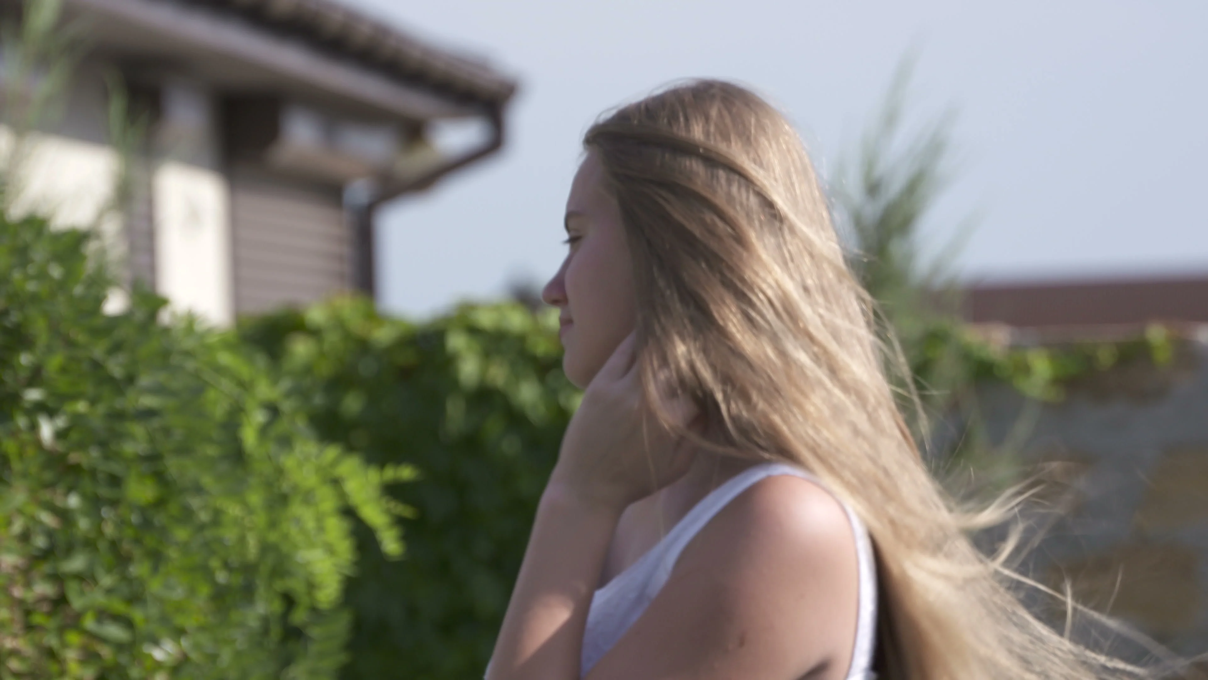 Girl's long hair blowing in the wind. Yo... | Stock Video | Pond5