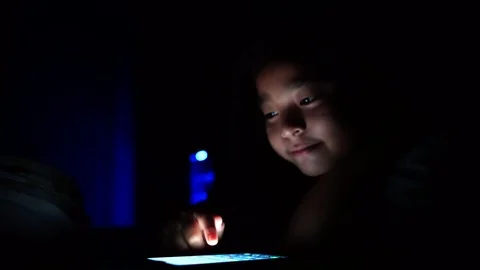 Girls lying on bed using smartphone texting on social media browsing online  動画素材 127543584