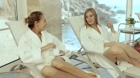 Girls lying on the loungers in the spa Stock Footage 59106288